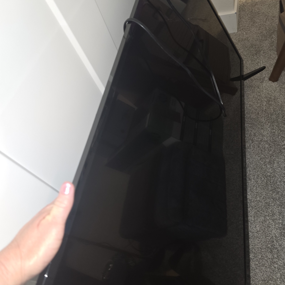 Sleek Black Flat Screen TV